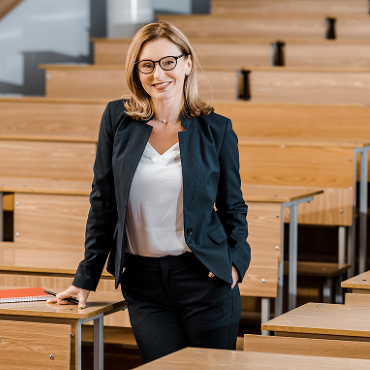 beautiful-female-university-professor-smiling-and-2024-11-17-04-15-05-utc.png